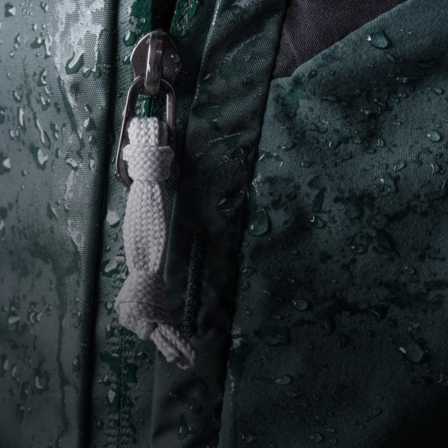 macro shot of zipper puller on wet bag