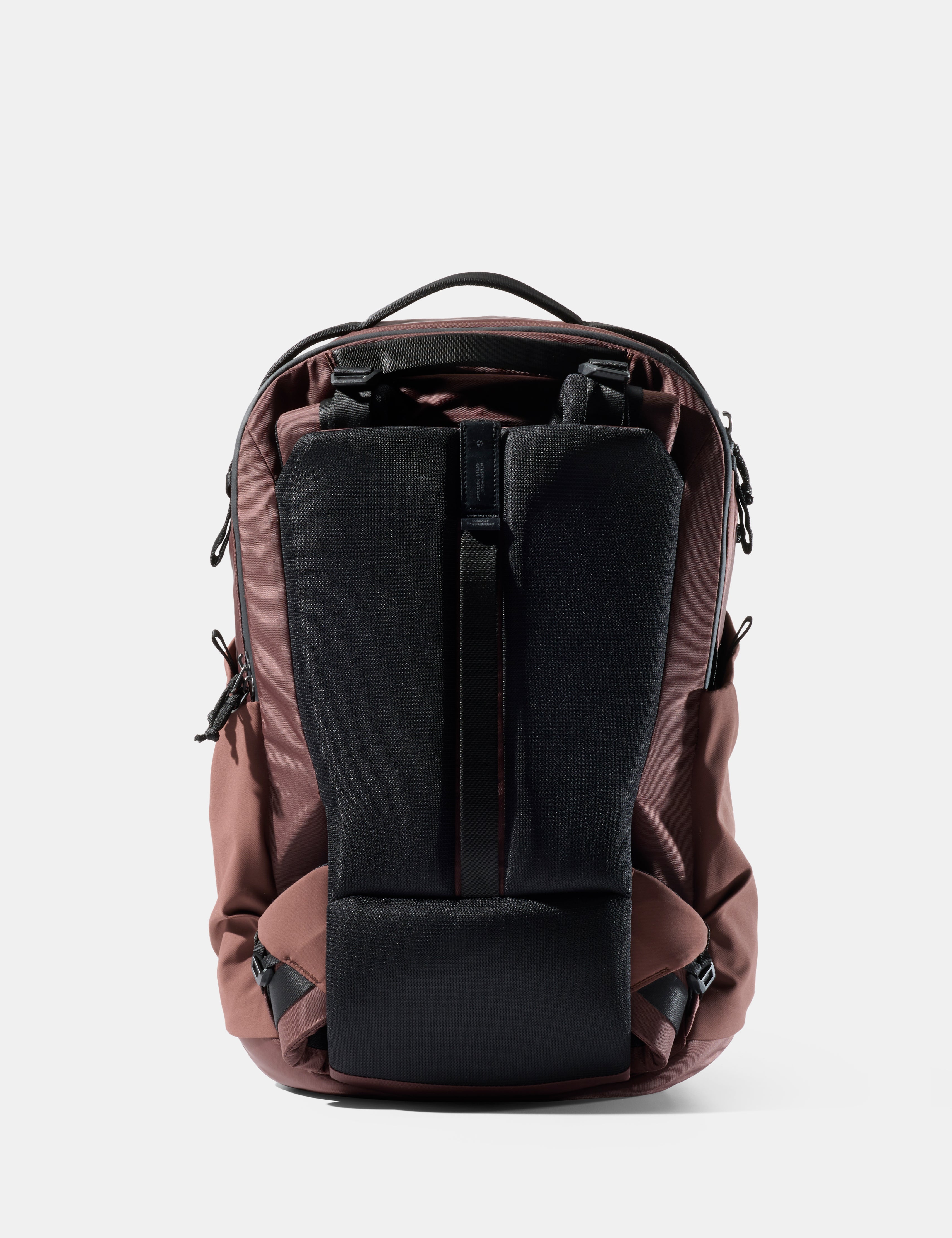 garnet backpack with black back panel on a white background
