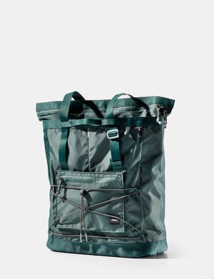 Green tote bag with multiple straps on a white background