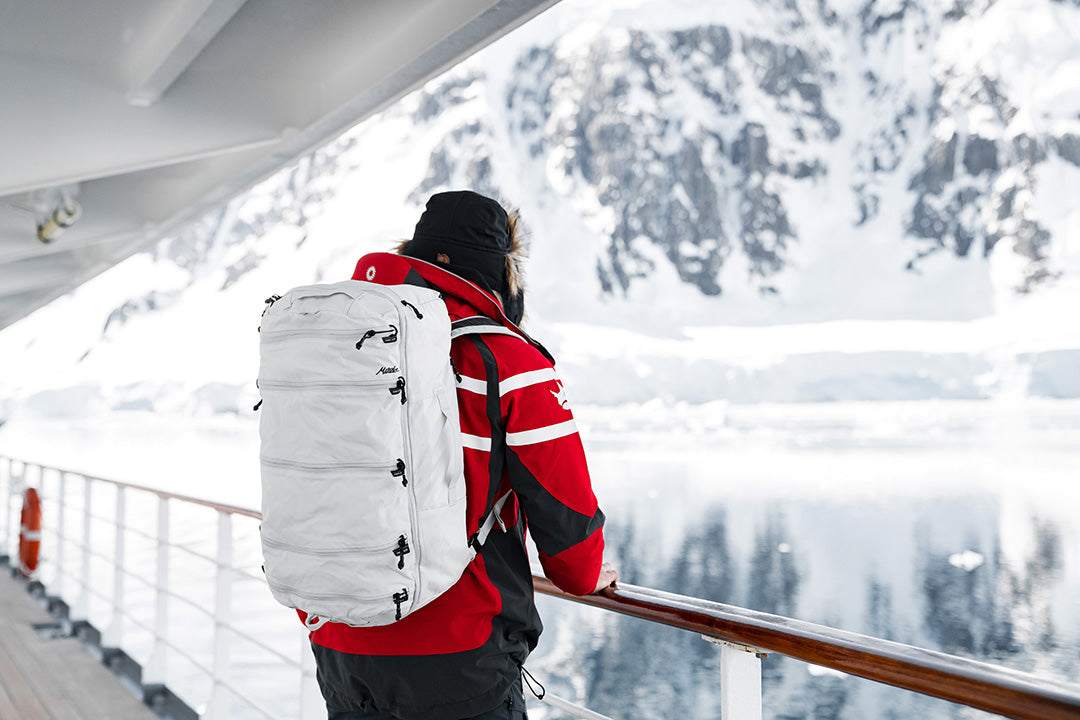 person wearing a backpack and looking at Antarctica